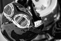 Black and White Vintage motorcycle helmet placed on a motorbike Royalty Free Stock Photo